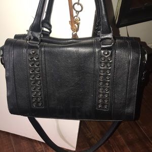 Studded black handbag
